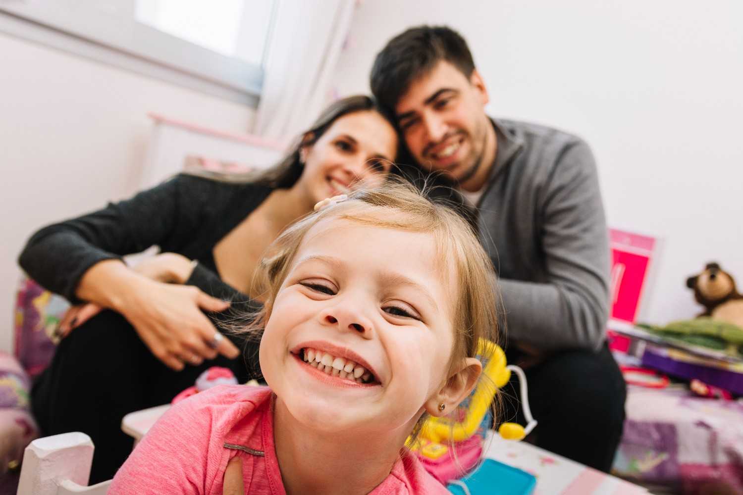 Happy girl with her parents, Sunshine KiDDS Dentistry